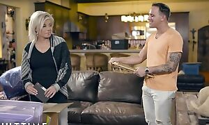 Blonde-haired mature pleases tattooed dude on leather couch